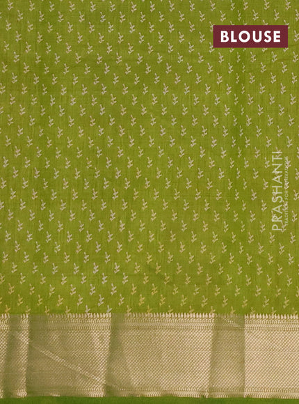 Semi raw silk saree light green with allover butta prints and zari woven border