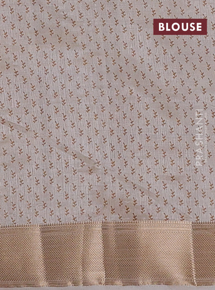 Semi raw silk saree cream with allover butta prints and zari woven border