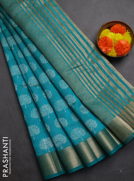 Semi raw silk saree teal green with allover butta prints and zari woven border