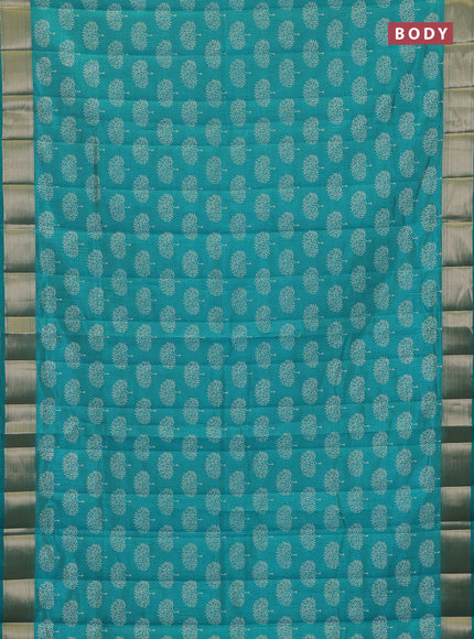 Semi raw silk saree teal green with allover butta prints and zari woven border