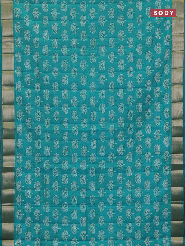 Semi raw silk saree teal green with allover butta prints and zari woven border