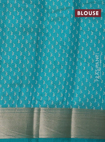 Semi raw silk saree teal green with allover butta prints and zari woven border