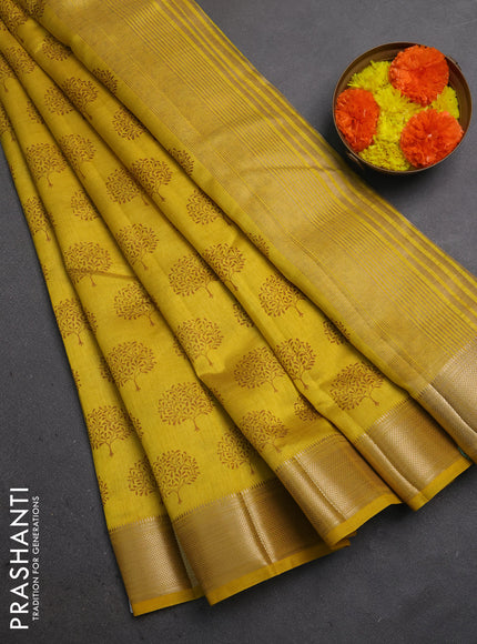 Semi raw silk saree mustard yellow with allover butta prints and zari woven border