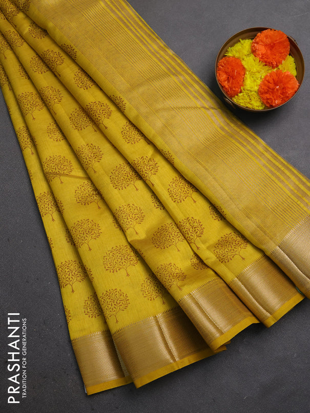 Semi raw silk saree mustard yellow with allover butta prints and zari woven border