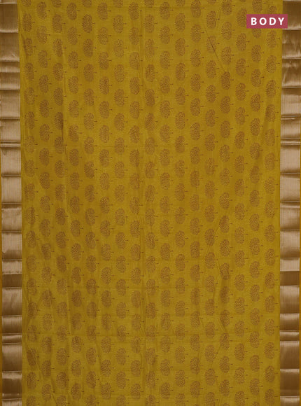 Semi raw silk saree mustard yellow with allover butta prints and zari woven border