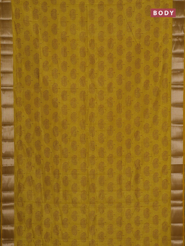 Semi raw silk saree mustard yellow with allover butta prints and zari woven border