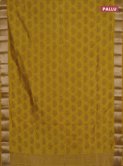 Semi raw silk saree mustard yellow with allover butta prints and zari woven border