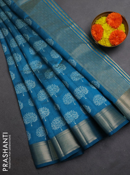 Semi raw silk saree teal blue with allover butta prints and zari woven border