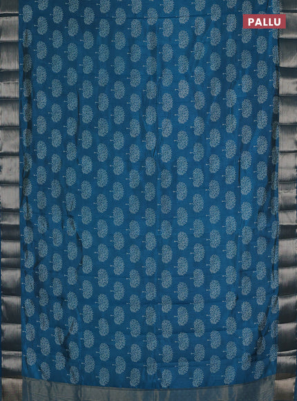 Semi raw silk saree teal blue with allover butta prints and zari woven border