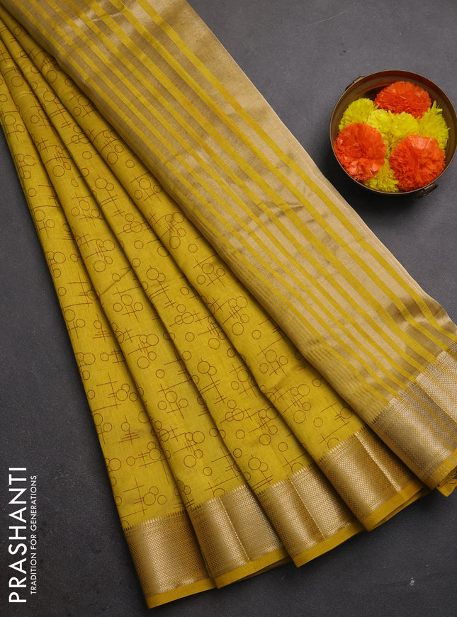 Semi raw silk saree mustard yellow with allover geometric prints and zari woven border
