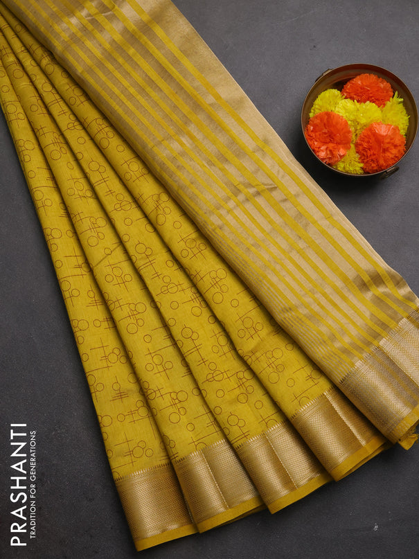 Semi raw silk saree mustard yellow with allover geometric prints and zari woven border