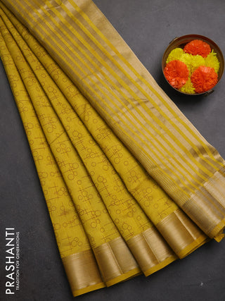 Semi raw silk saree mustard yellow with allover geometric prints and zari woven border