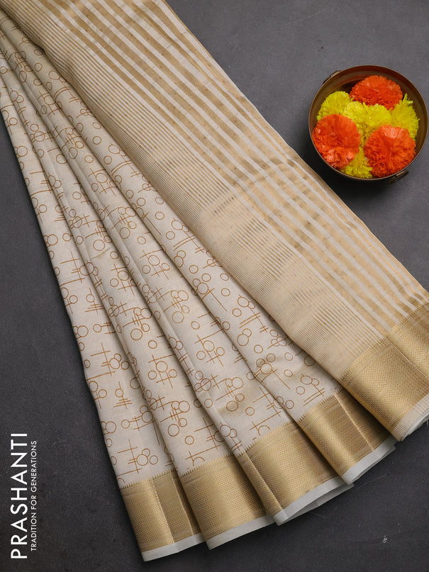 Semi raw silk saree cream with allover geometric prints and zari woven border