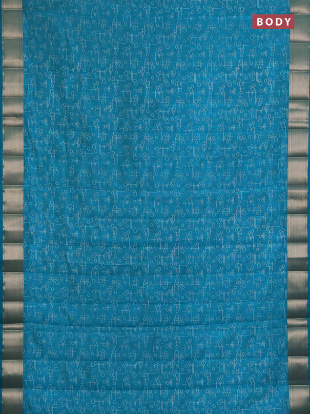 Semi raw silk saree teal green with allover geometric prints and zari woven border