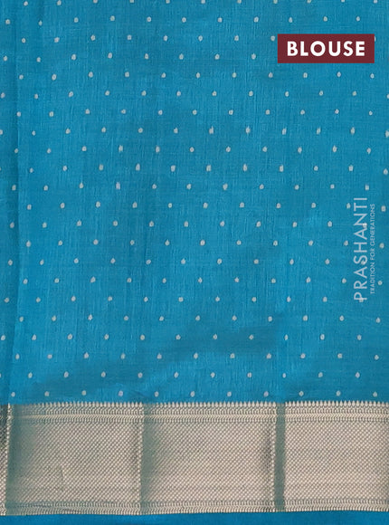 Semi raw silk saree teal green with allover geometric prints and zari woven border
