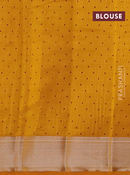 Semi raw silk saree dark mustard shade with allover geometric prints and zari woven border