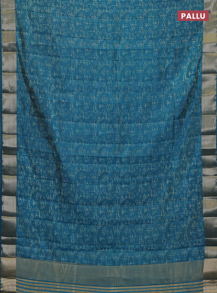 Semi raw silk saree teal blue with allover geometric prints and zari woven border
