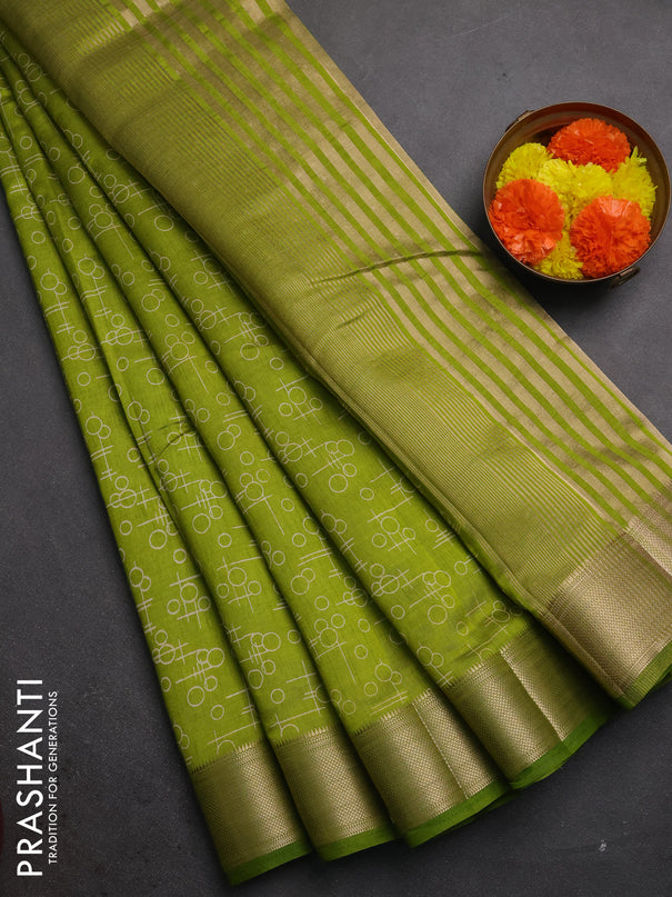 Semi raw silk saree light green with allover geometric prints and zari woven border