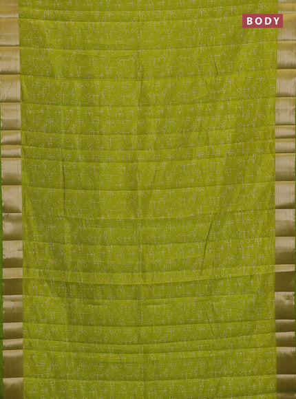 Semi raw silk saree light green with allover geometric prints and zari woven border