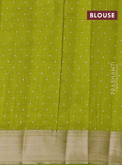 Semi raw silk saree light green with allover geometric prints and zari woven border