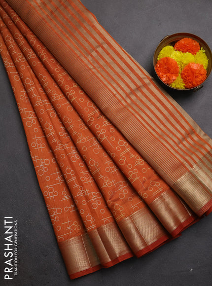 Semi raw silk saree rustic orange with allover geometric prints and zari woven border