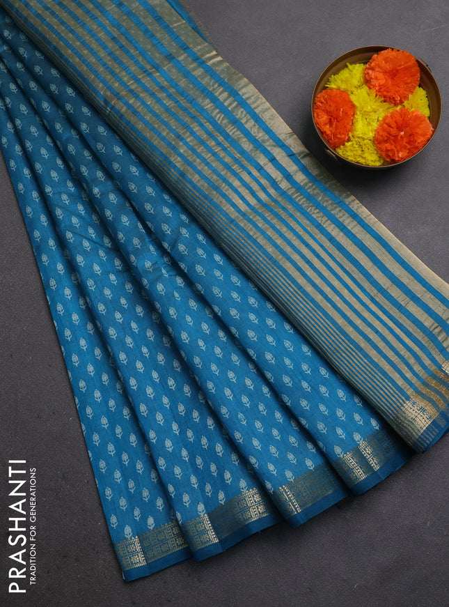 Semi raw silk saree teal blue with allover butta prints and zari woven border