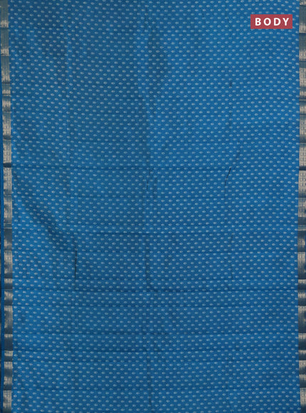 Semi raw silk saree teal blue with allover butta prints and zari woven border