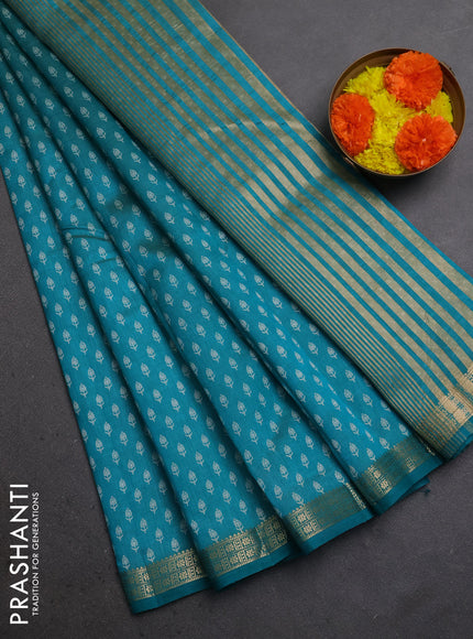 Semi raw silk saree teal green with allover butta prints and zari woven border