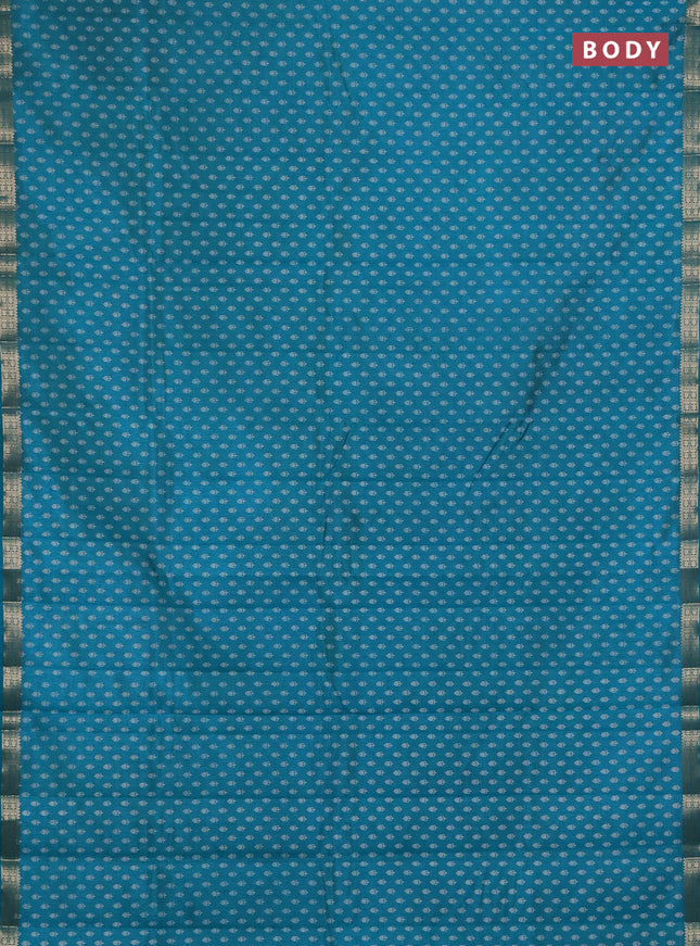 Semi raw silk saree teal green with allover butta prints and zari woven border