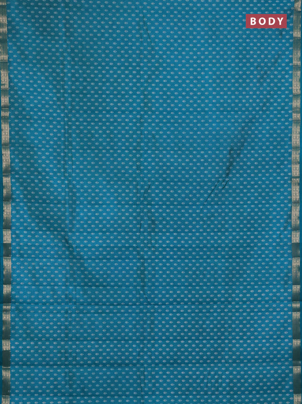 Semi raw silk saree teal green with allover butta prints and zari woven border
