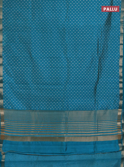 Semi raw silk saree teal green with allover butta prints and zari woven border