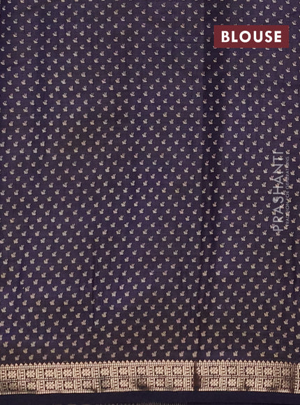 Semi raw silk saree navy blue with allover butta prints and zari woven border