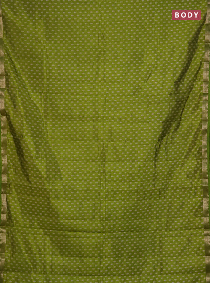 Semi raw silk saree light green with allover butta prints and zari woven border