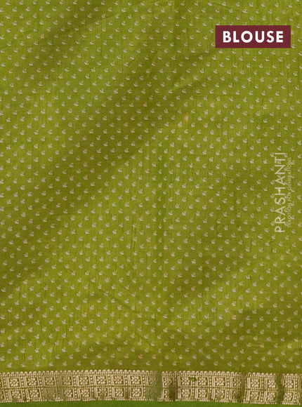 Semi raw silk saree light green with allover butta prints and zari woven border