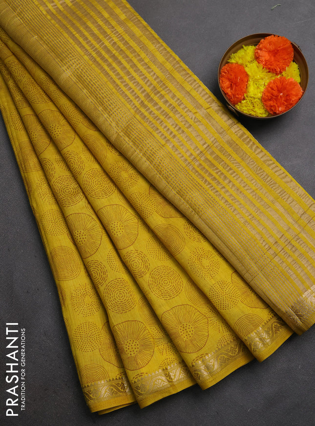 Semi raw silk saree mustard yellow with allover geometric prints and small zari woven border