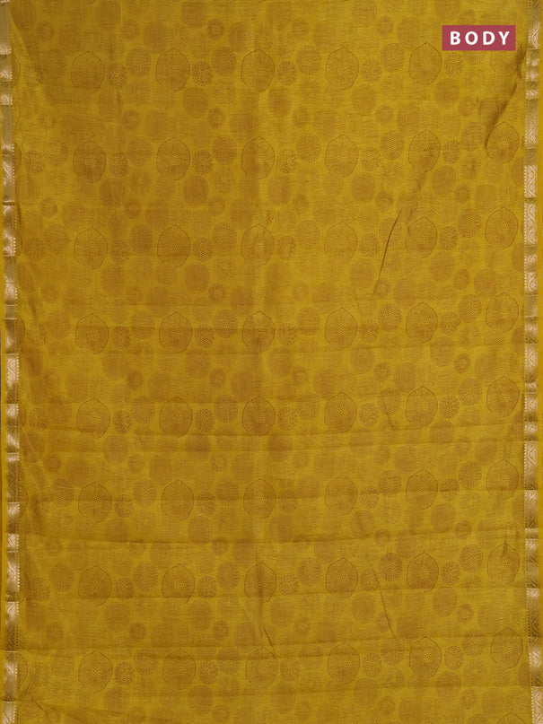 Semi raw silk saree mustard yellow with allover geometric prints and small zari woven border