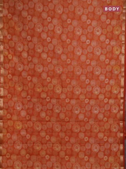 Semi raw silk saree rustic orange with allover geometric prints and small zari woven border