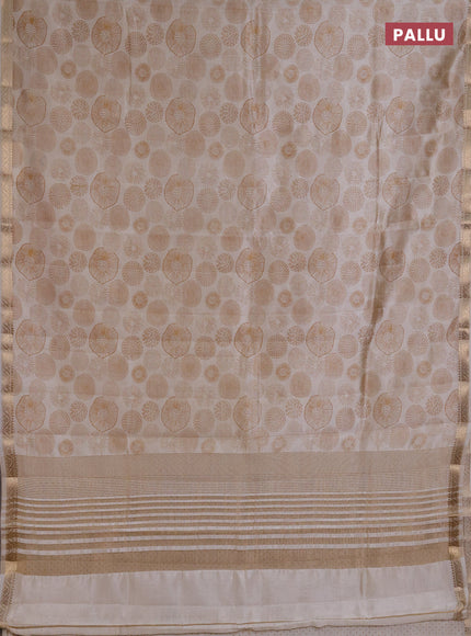 Semi raw silk saree cream with allover geometric prints and small zari woven border