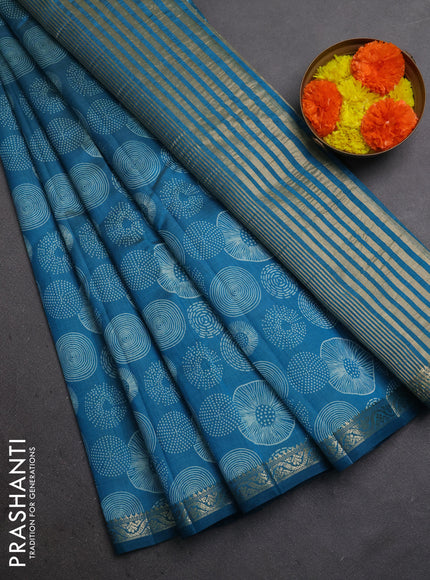 Semi raw silk saree teal blue with allover geometric prints and small zari woven border