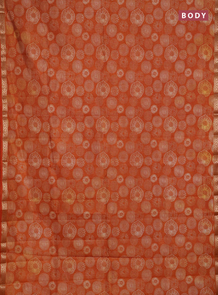 Semi raw silk saree rust shade with allover geometric prints and small zari woven border