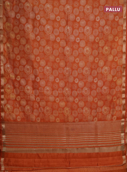 Semi raw silk saree rust shade with allover geometric prints and small zari woven border