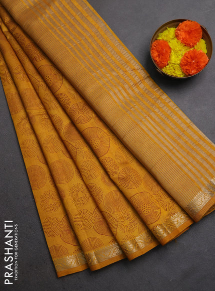 Semi raw silk saree dark mustard with allover geometric prints and small zari woven border