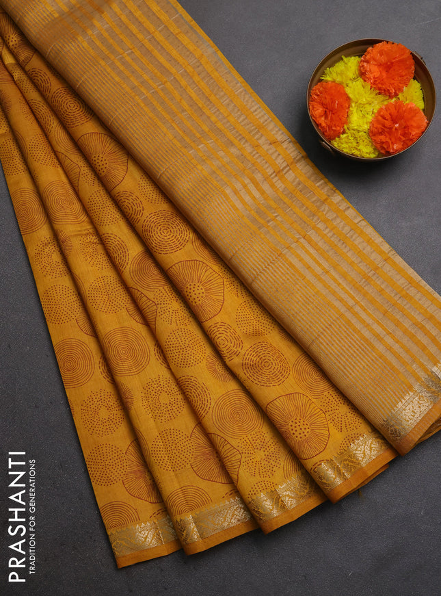 Semi raw silk saree dark mustard with allover geometric prints and small zari woven border