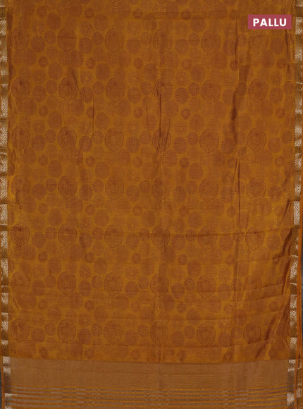 Semi raw silk saree dark mustard with allover geometric prints and small zari woven border