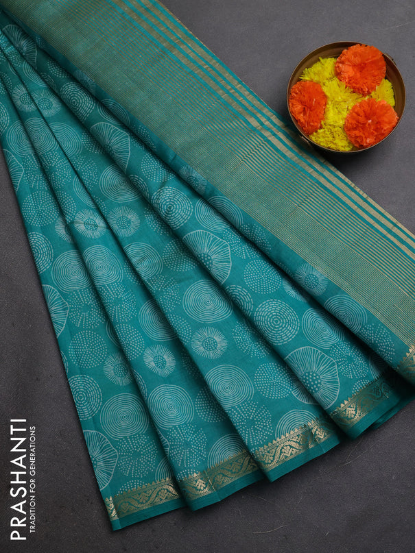 Semi raw silk saree teal green with allover geometric prints and small zari woven border