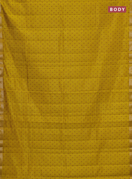 Semi raw silk saree mustard yellow with allover butta prints and zari woven border