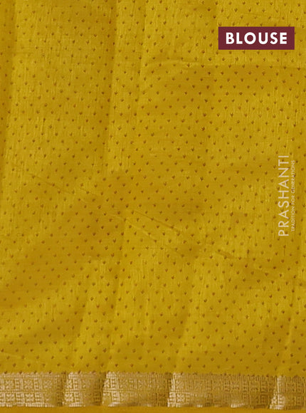 Semi raw silk saree mustard yellow with allover butta prints and zari woven border