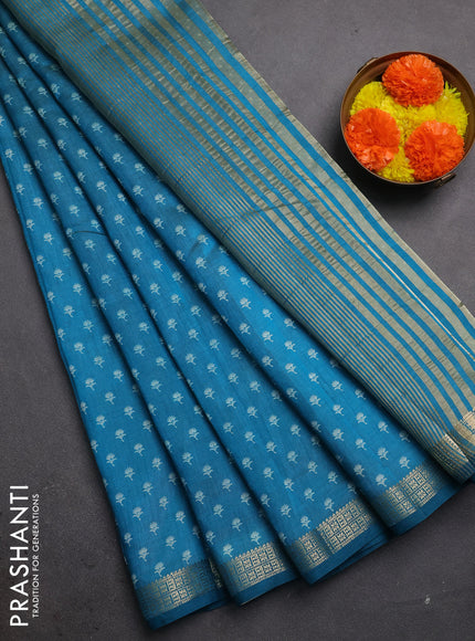 Semi raw silk saree teal blue with allover butta prints and zari woven border