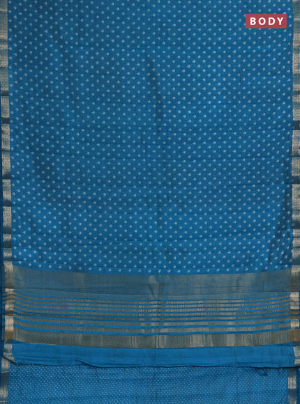 Semi raw silk saree teal blue with allover butta prints and zari woven border