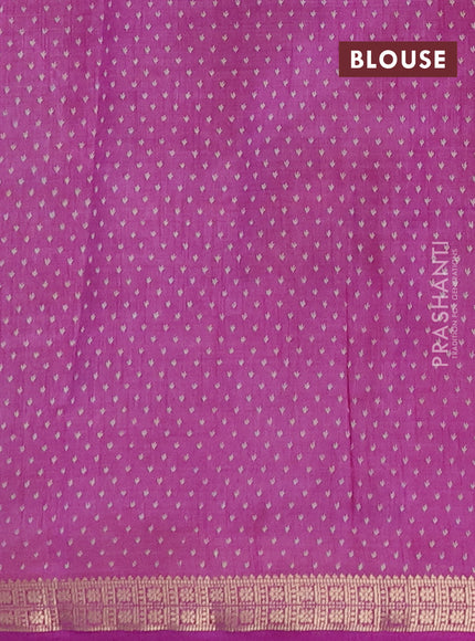 Semi raw silk saree lavender with allover butta prints and zari woven border